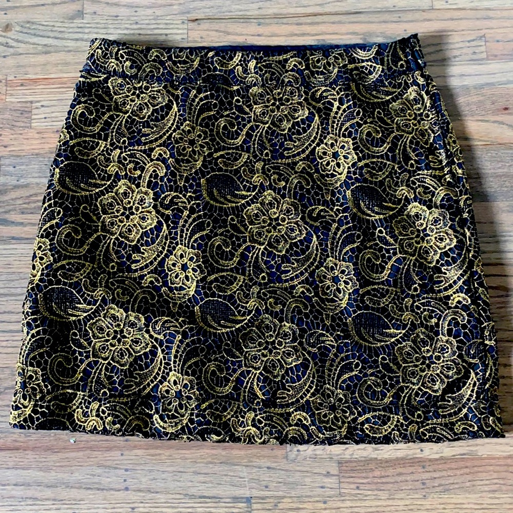 Gorgeous black and gold skirt.